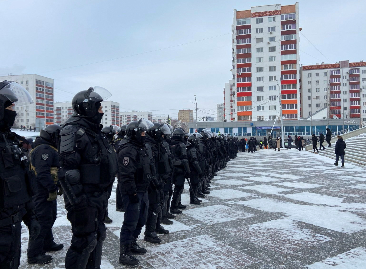 Law enforcement officers secure a square following a protest against the court verdict of a leading rights activist in Ufa